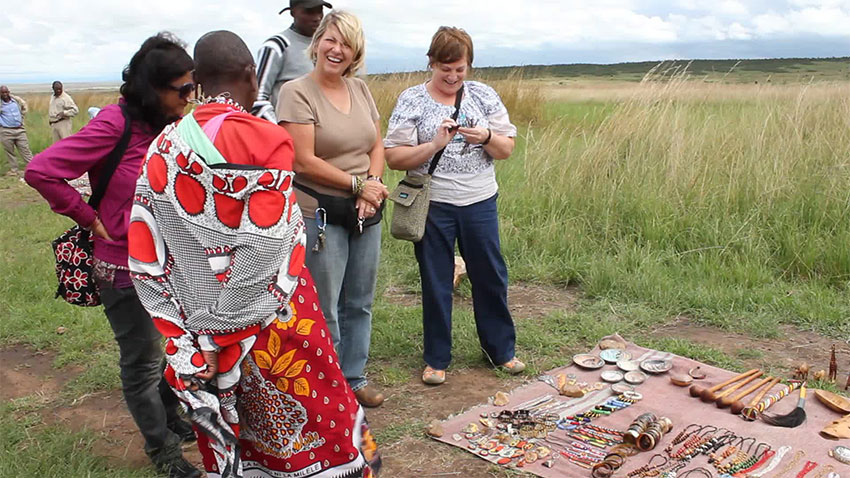 Tourist-in-kenya-checking-maasai-culture